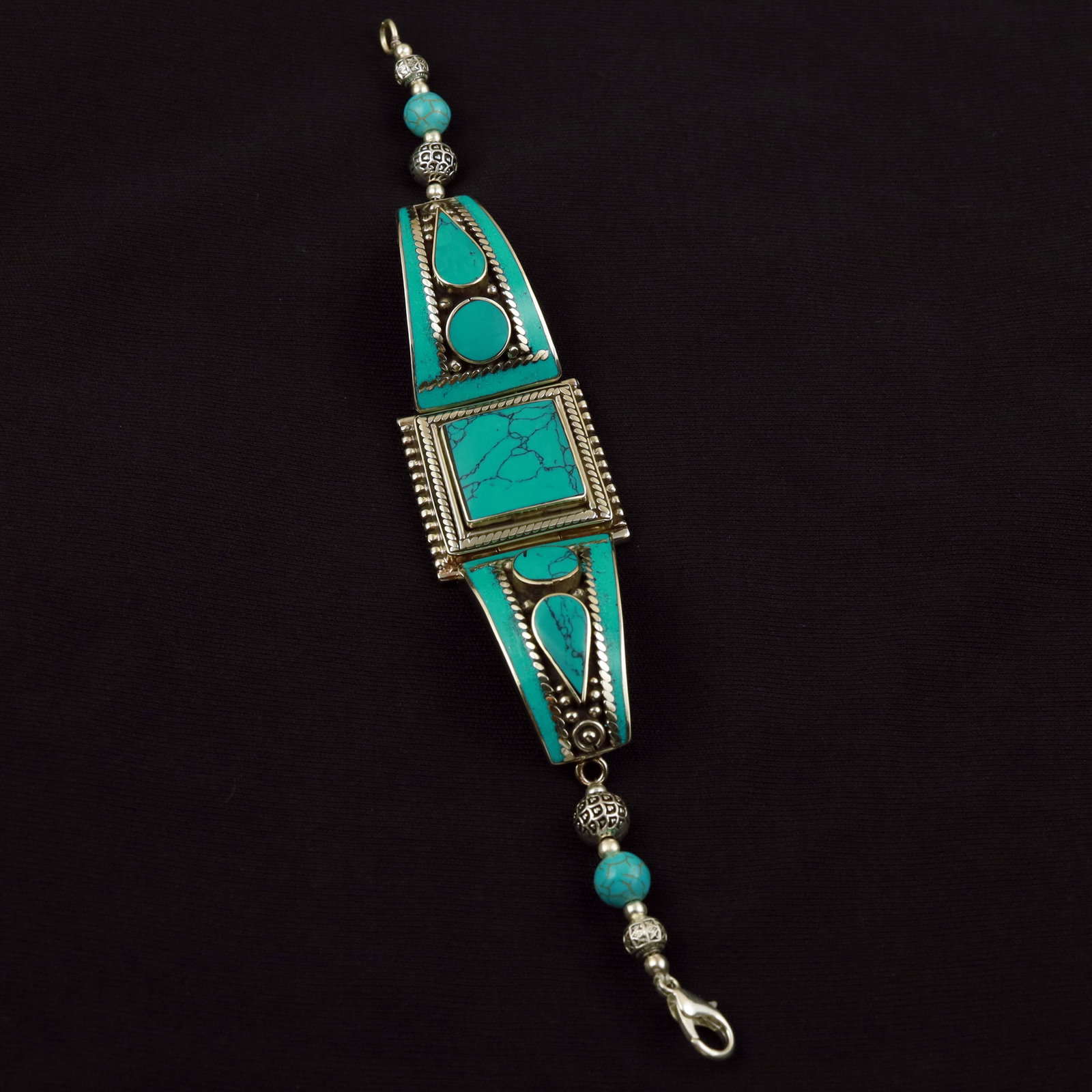 Tibetan Natural Turquoise Handmade Ethnic Bracelet: Product ID: 260512185258 Product - Tibetan Handmade Ethnic Bracelet Gemstone - Natural Turquoise Size - 7 Inch Weight - 40 Gram Approx Metal - Brass & Copper mix Metal Origin - Nepal Country/Region of