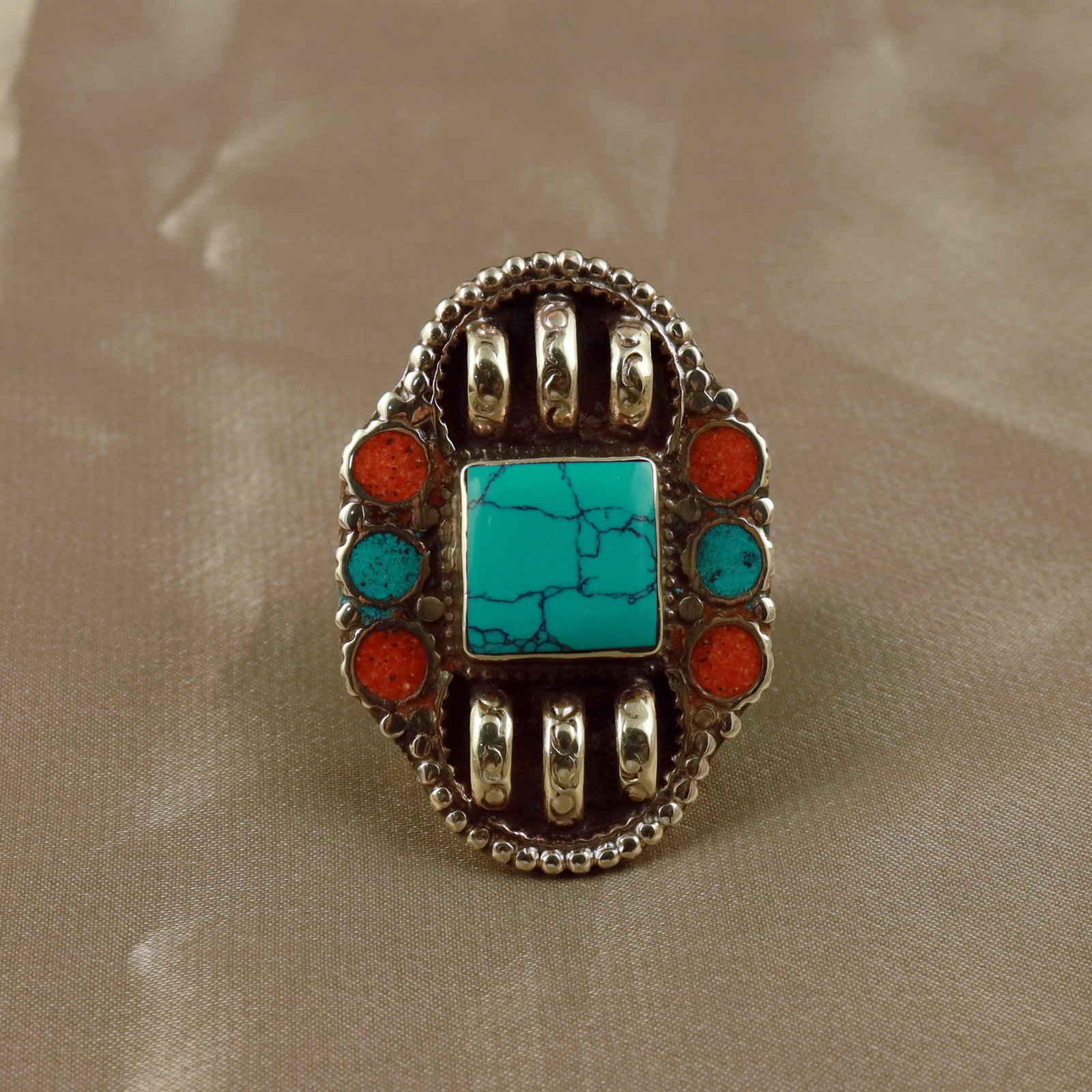 Tibetan Turquoise & Coral Handmade Royal Ring - Free Size: Product ID: 260512154011 Product - Tibetan Handmade Ethnic Ring Ring Size - Free Size Ring Weight - 17 Gram Gemstone - Natural Turquoise & Coral Metal - Brass & Copper mix Metal Origin - Nepal Country