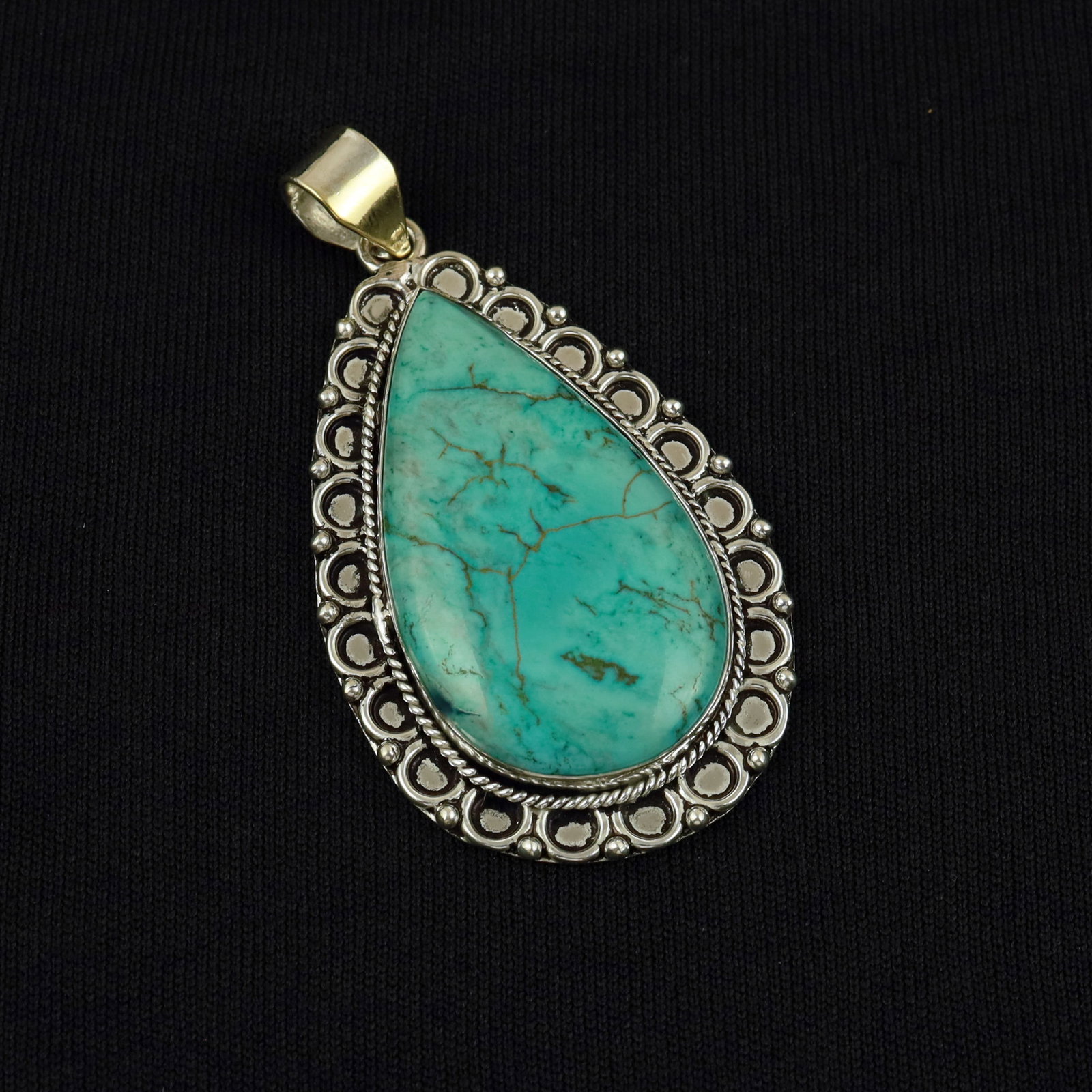 Natural Turquoise Silver Plated Handmade Pendant: Product ID: 260513102933 Product - Handmade Silver Plated Pendant Metal - 92.5 Sterling Silver Plated Pendant Size - 5x3.5 CM Gemstone - Turquoise Gemstone Origin - Tibet Gemstone Shape - Pear Pendant