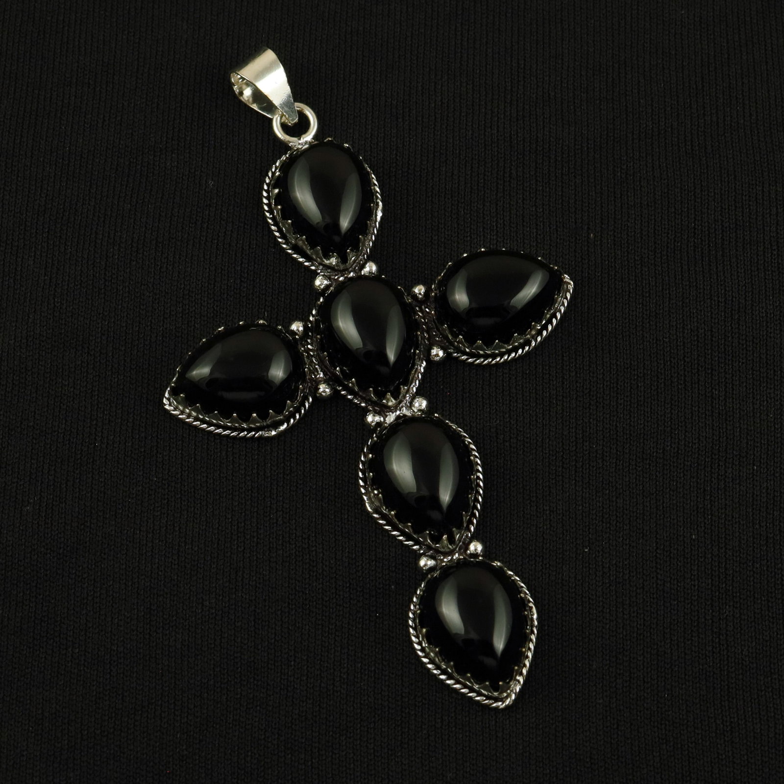Natural Balck Onyx Silver Plated Handmade Cross Pendant: Product ID: 260512164703 Product - Handmade Silver Plated Pendant Metal - 92.5 Sterling Silver Plated Pendant Size - 3x2 Inch Gemstone - Balck Onyx Gemstone Origin - India Gemstone Size - 12X16 MM ( 6