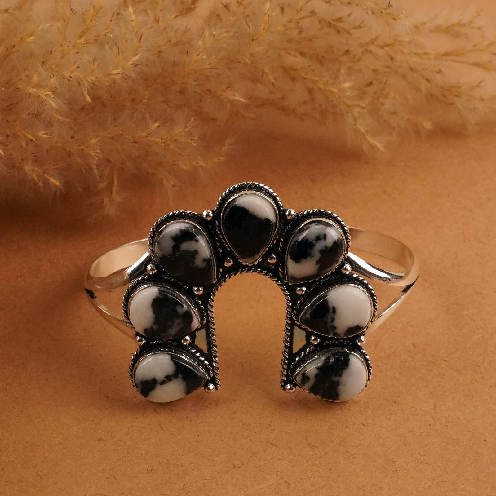 Natural Zebra Jasper Silver Plated Handmade Cuff Bangle: Product ID: 260411163358 Product - Handmade Silver Plated Cuff Bangle Metal - 92.5 Sterling Silver Plated Bangle Size - 7x4 CM (Adjustable) Gemstone - Zebra Jasper Gemstone Origin - Africa Gemstone Si
