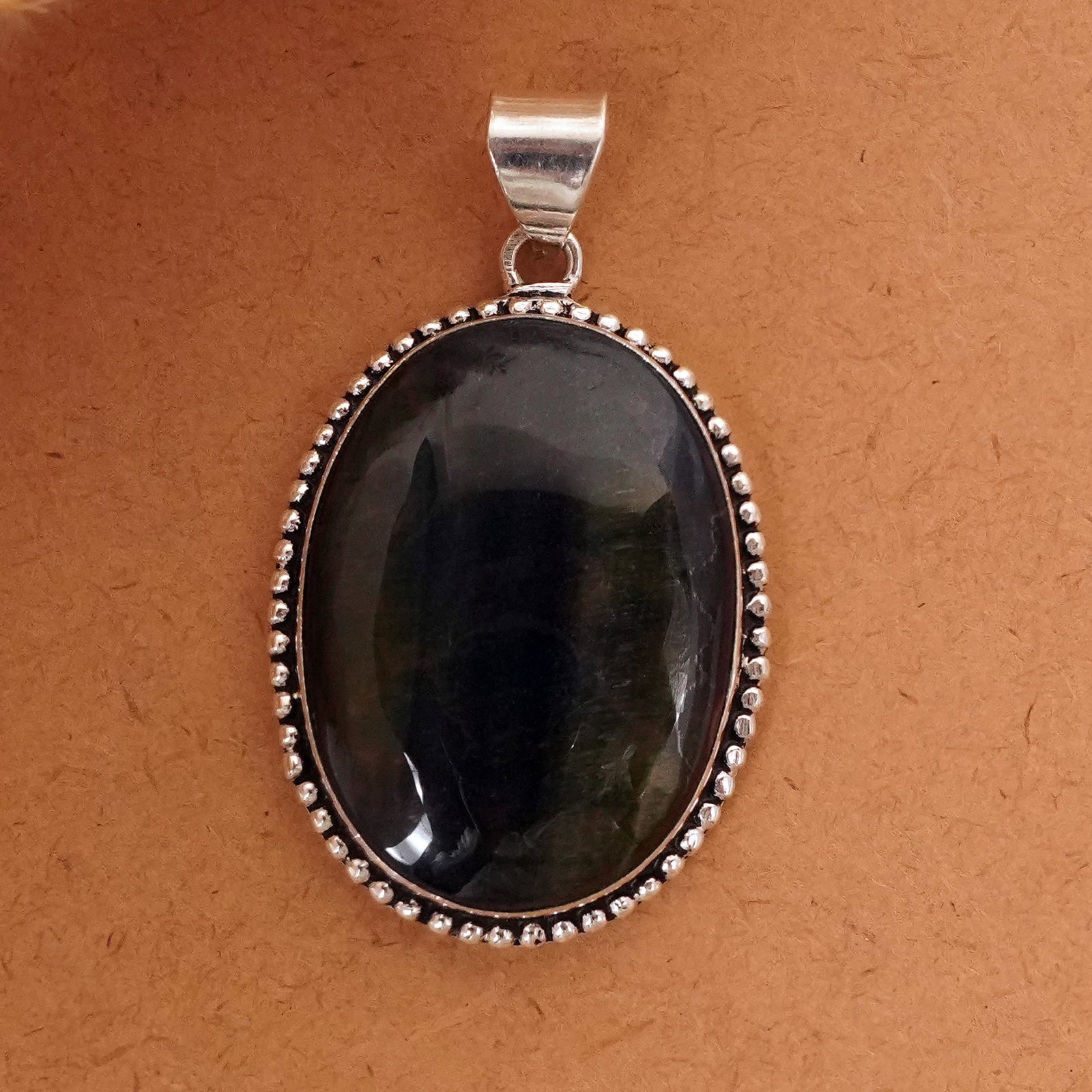 Natural Black Tiger Eye Silver Plated Handmade Pendant: Product ID: 260411140221 Product - Handmade Silver Plated Pendant Metal - 92.5 Sterling Silver Plated Pendant Size - 4x3 CM Gemstone - Black Tiger Eye Gemstone Origin - South Africa Gemstone Shape - O