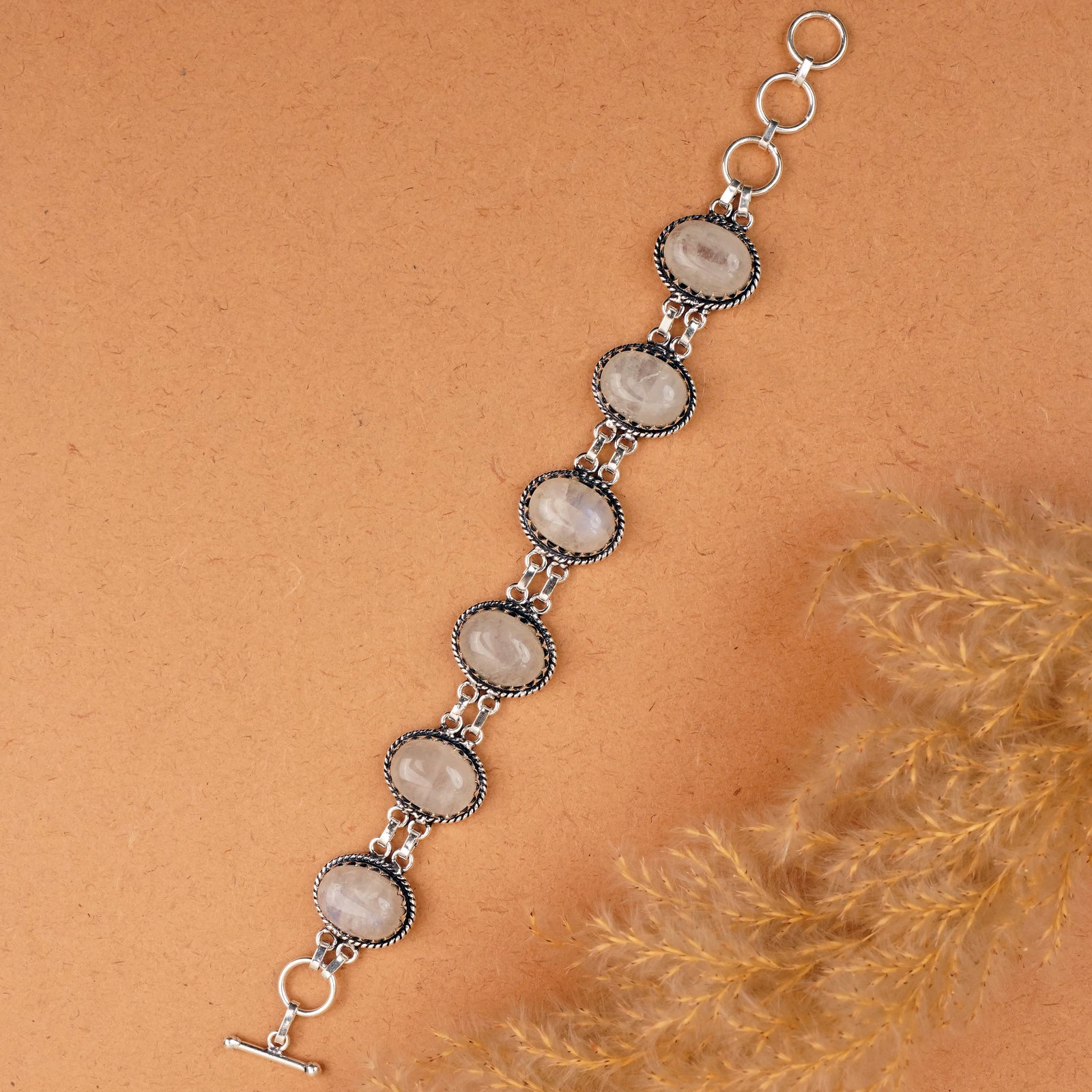Natural Rainbow Moonstone Silver Plated Handmade Bracelet: Product ID: 260410134703 Product - Handmade Silver Plated Bracelet Metal - 92.5 Sterling Silver Plated Bracelet Length - 6 Inch + 2 Inch Gemstone - Rainbow Moonstone Gemstone Size -12X16 MM ( 6 Stone)