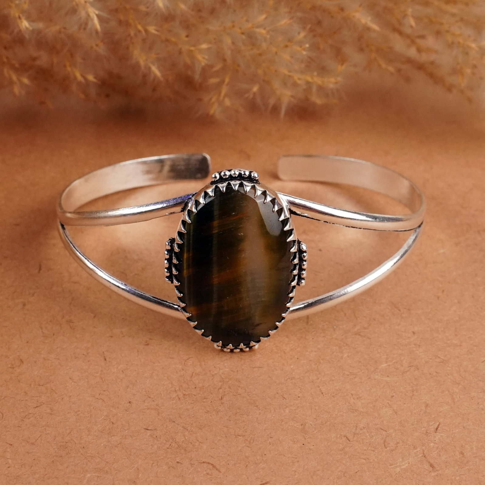 Natural Tiger Eye Silver Plated Handmade Cuff Bangle: Product ID: 260408141914 Product - Handmade Silver Plated Cuff Bangle Metal - 92.5 Sterling Silver Plated Bangle Size - 7x5.5 CM (Adjustable) Gemstone - Tiger Eye Gemstone Origin - South Africa Gemsto