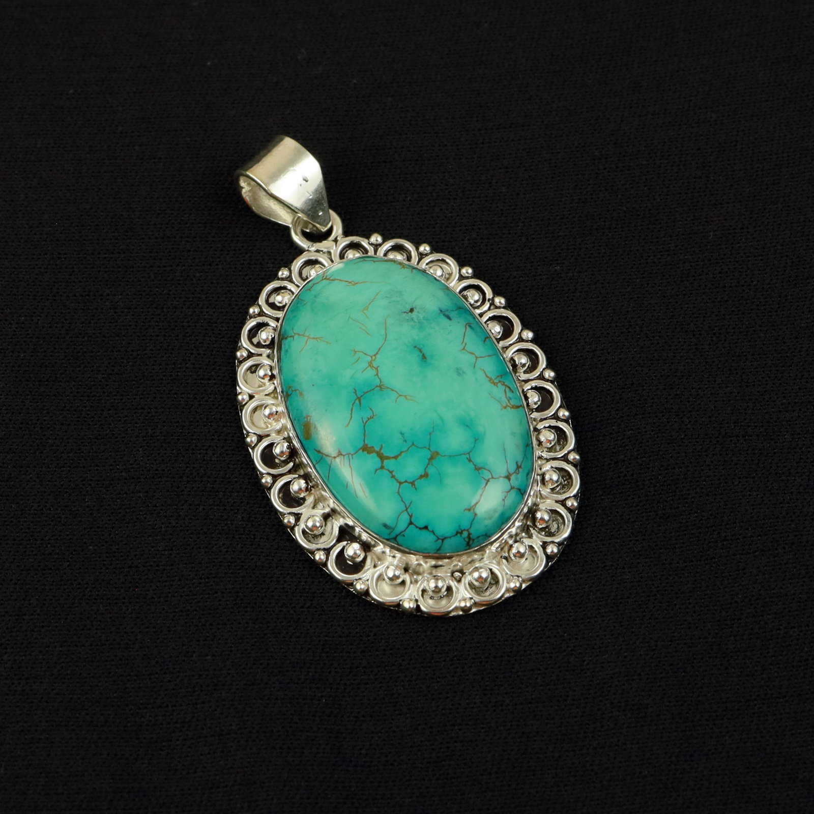 Natural Turquoise Sterling Silver Plated Handmade Pendant: Product ID: 260517181309 Product - Handmade Silver Plated Pendant Metal - 92.5 Sterling Silver Plated Pendant Size - 4.5x3 CM Gemstone - Turquoise Gemstone Origin - Tibet Gemstone Shape - Oval Pendant