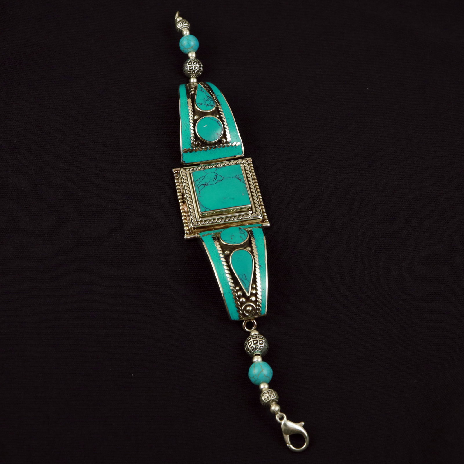 Tibetan Turquoise Handmade Ethnic Bold Bracelet: Product ID: 260517173651 Product - Tibetan Handmade Ethnic Bracelet Gemstone - Natural Turquoise Size - 7 Inch Weight - 45 Gram Approx Metal - Brass & Copper mix Metal Origin - Nepal Country/Region of