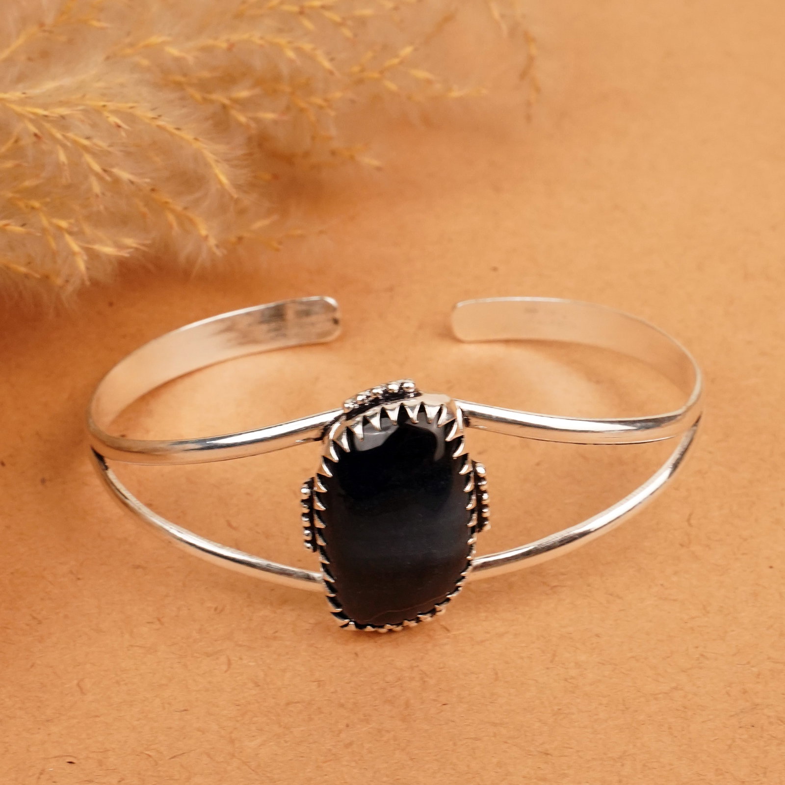 Natural Black Tiger Eye Silver Plated Handmade Cuff Bangle: Product ID: 260412132547 Product - Handmade Silver Plated Cuff Bangle Metal - 92.5 Sterling Silver Plated Bangle Size - 7.5x5.5 CM (Adjustable) Gemstone - Black Tiger Eye Gemstone Origin - South Afric