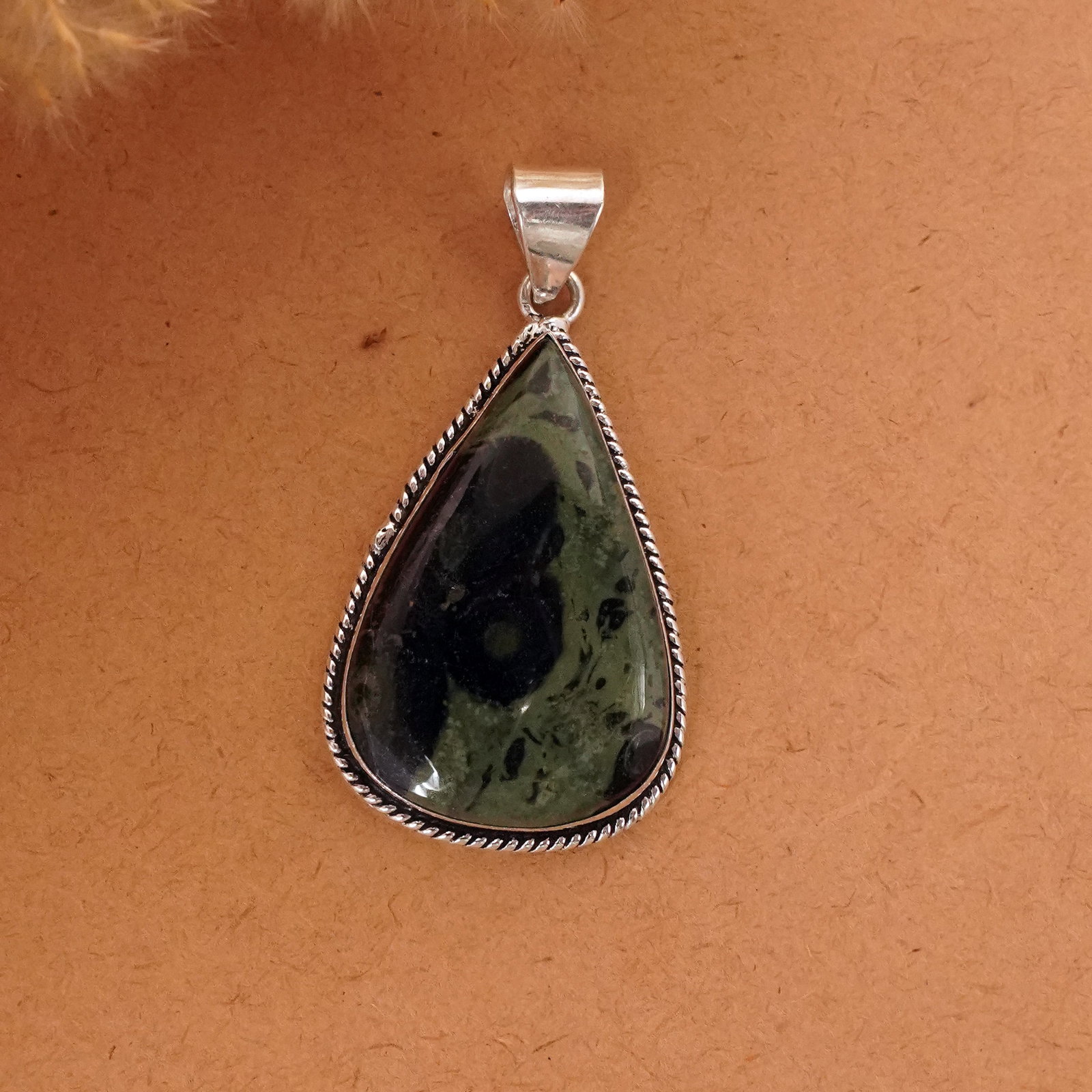 Natural Kambaba Jasper Silver Plated Handmade Pendant: Product ID: 260411133408 Product - Handmade Silver Plated Pendant Metal - 92.5 Sterling Silver Plated Pendant Size - 4x3 CM Gemstone - Kambaba Jasper Gemstone Origin - Madagascar Gemstone Shape - Pear