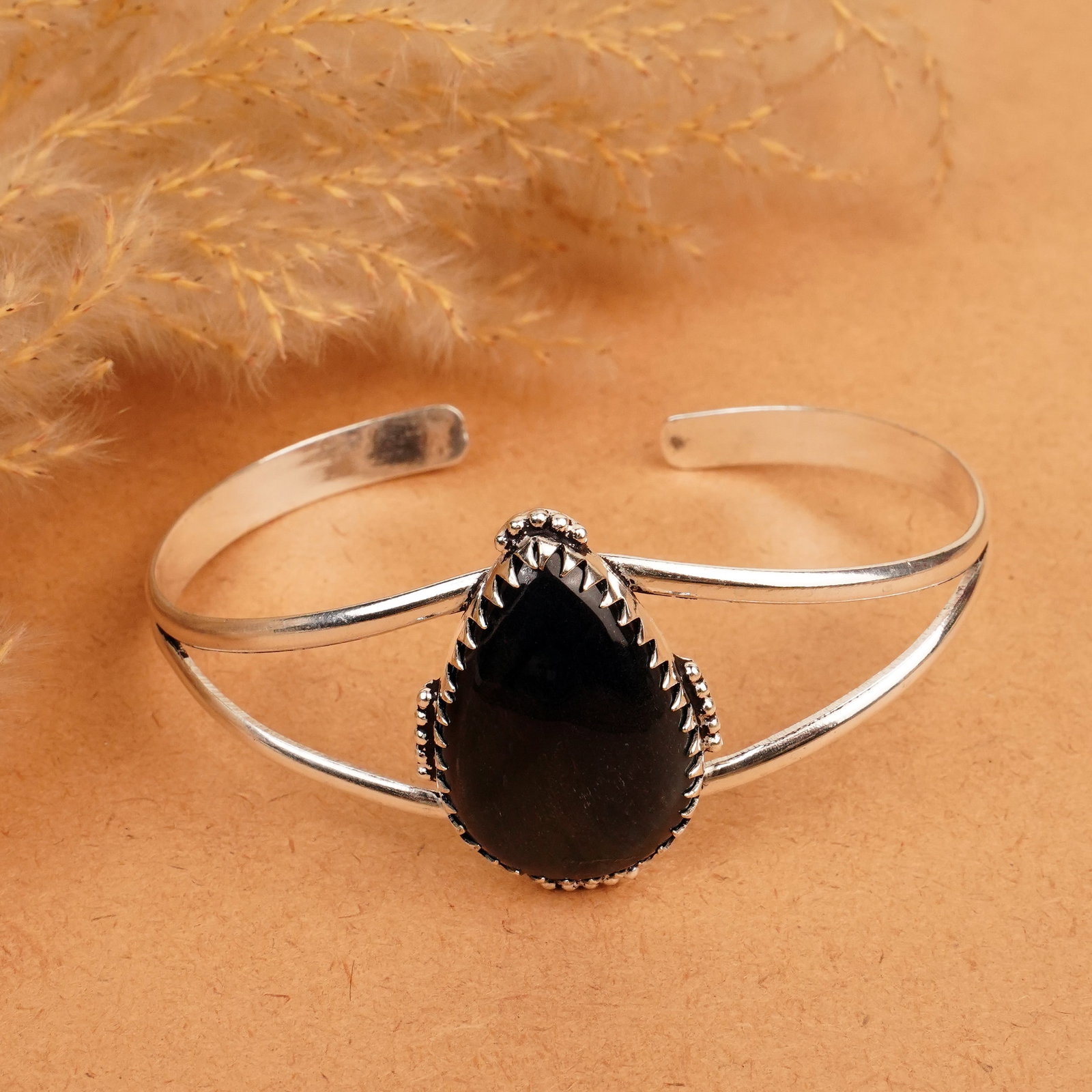 Natural Black Tiger Eye Silver Plated Handmade Cuff Bangle: Product ID: 260412112156 Product - Handmade Silver Plated Cuff Bangle Metal - 92.5 Sterling Silver Plated Bangle Size - 7x5.5 CM (Adjustable) Gemstone - Black Tiger Eye Gemstone Origin - South Africa 