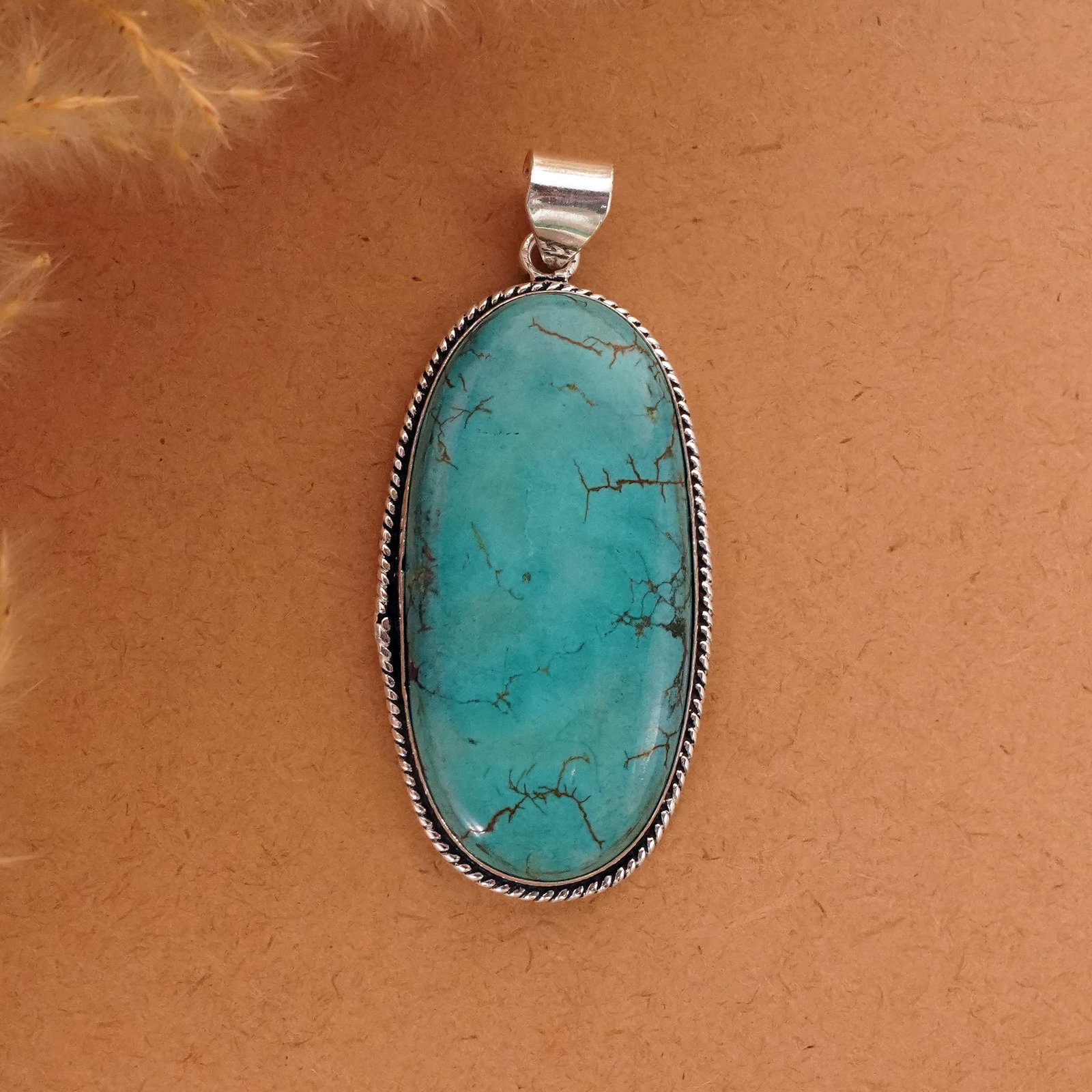 Natural Turquoise Sterling Silver Plated Handmade Pendant: Product ID: 260411122853 Product - Handmade Silver Plated Pendant Metal - 92.5 Sterling Silver Plated Pendant Size - 5.5x3 CM Gemstone - Turquoise Gemstone Origin - Tibet Gemstone Shape - Oval Pendant
