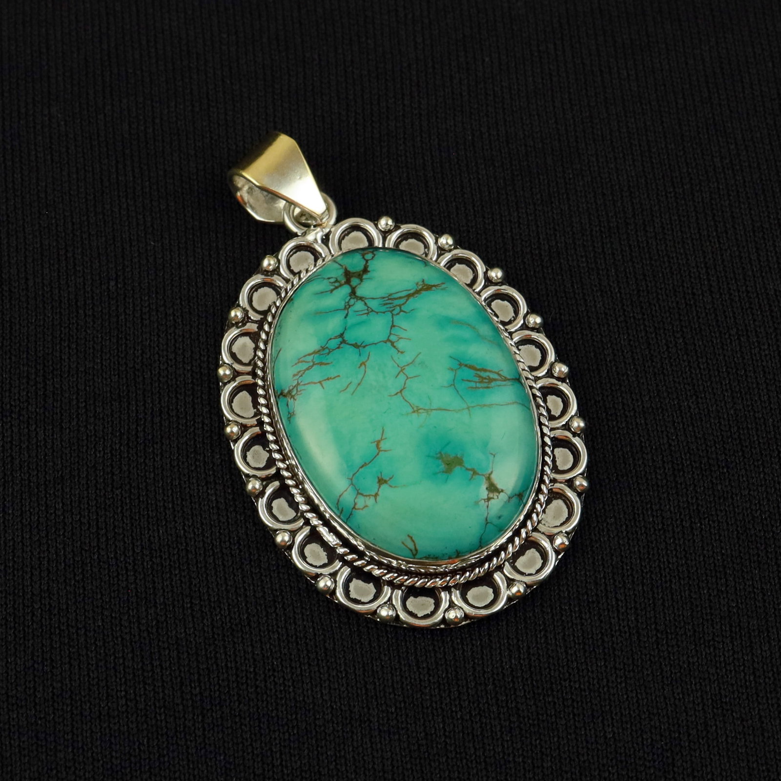 Natural Turquoise Sterling Silver Plated Handmade Pendant: Product ID: 260517183857 Product - Handmade Silver Plated Pendant Metal - 92.5 Sterling Silver Plated Pendant Size - 4x3 CM Gemstone - Turquoise Gemstone Origin - Tibet Gemstone Shape - Oval Pendant W