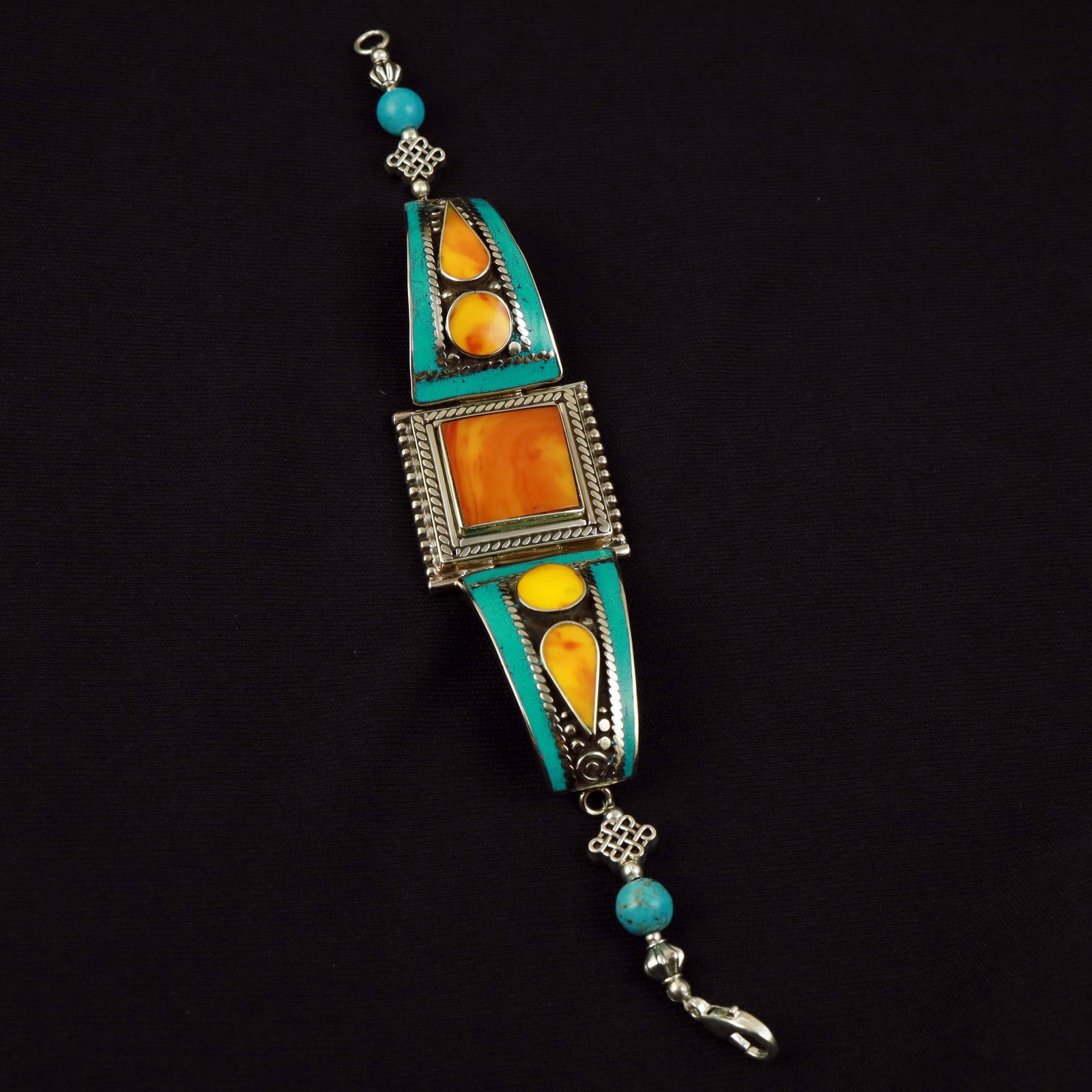 Tibetan Turquoise & Copal Handmade Ethnic Bracelet: Product ID: 260517173858 Product - Tibetan Handmade Ethnic Bracelet Gemstone - Natural Turquoise & Copal Size - 7 Inch Weight - 45 Gram Approx Metal - Brass & Copper mix Metal Origin - Nepal Country/R