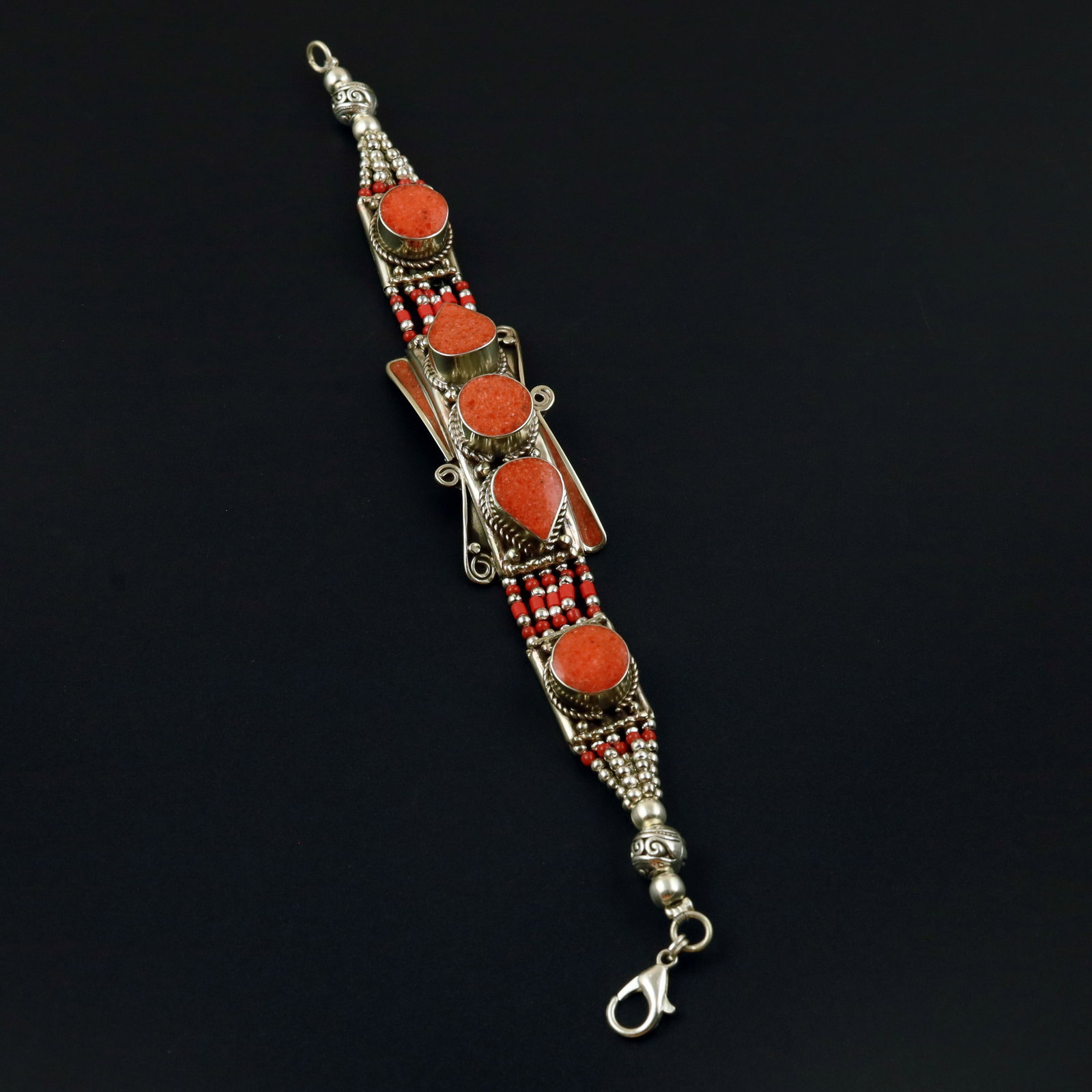 Tibetan Red Coral Handmade Choker Bold Bracelet: Product ID: 260513130704 Product - Tibetan Handmade Ethnic Bracelet Gemstone - Natural Red Coral Size - 7 Inch Weight - 50 Gram Approx Metal - Brass & Copper mix Metal Origin - Nepal Country/Region of