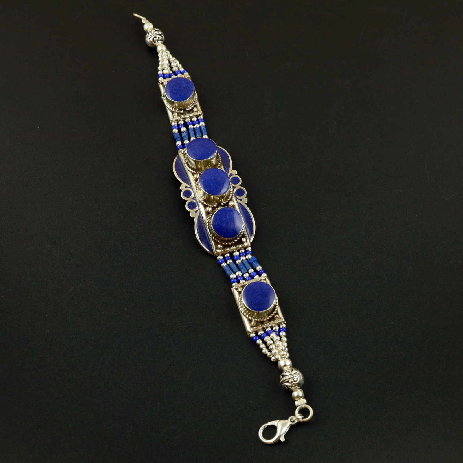 Natural Afghani Lapis Lazuli Handmade Bracelet: Product ID: 260513130036 Product - Tibetan Handmade Ethnic Bracelet Gemstone - Natural Lapis Lazuli Size - 7 Inch Weight - 50 Gram Approx Metal - Brass & Copper mix Metal Origin - Nepal Country/Region