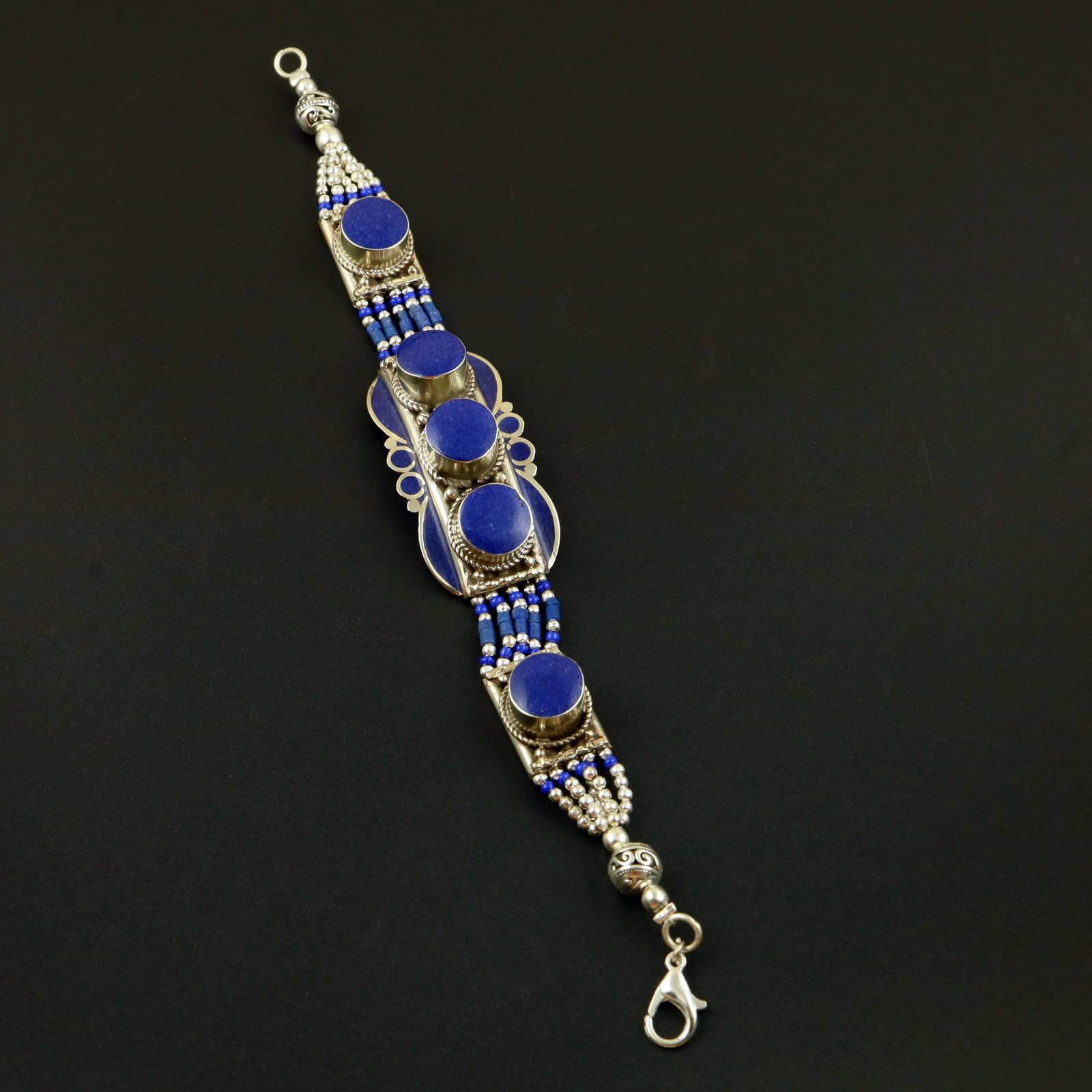 Afghani Natural Lapis Lazuli Handmade Bold Bracelet: Product ID: 260513130100 Product - Tibetan Handmade Ethnic Bracelet Gemstone - Natural Lapis Lazuli Size - 7 Inch Weight - 50 Gram Approx Metal - Brass & Copper mix Metal Origin - Nepal Country/Region