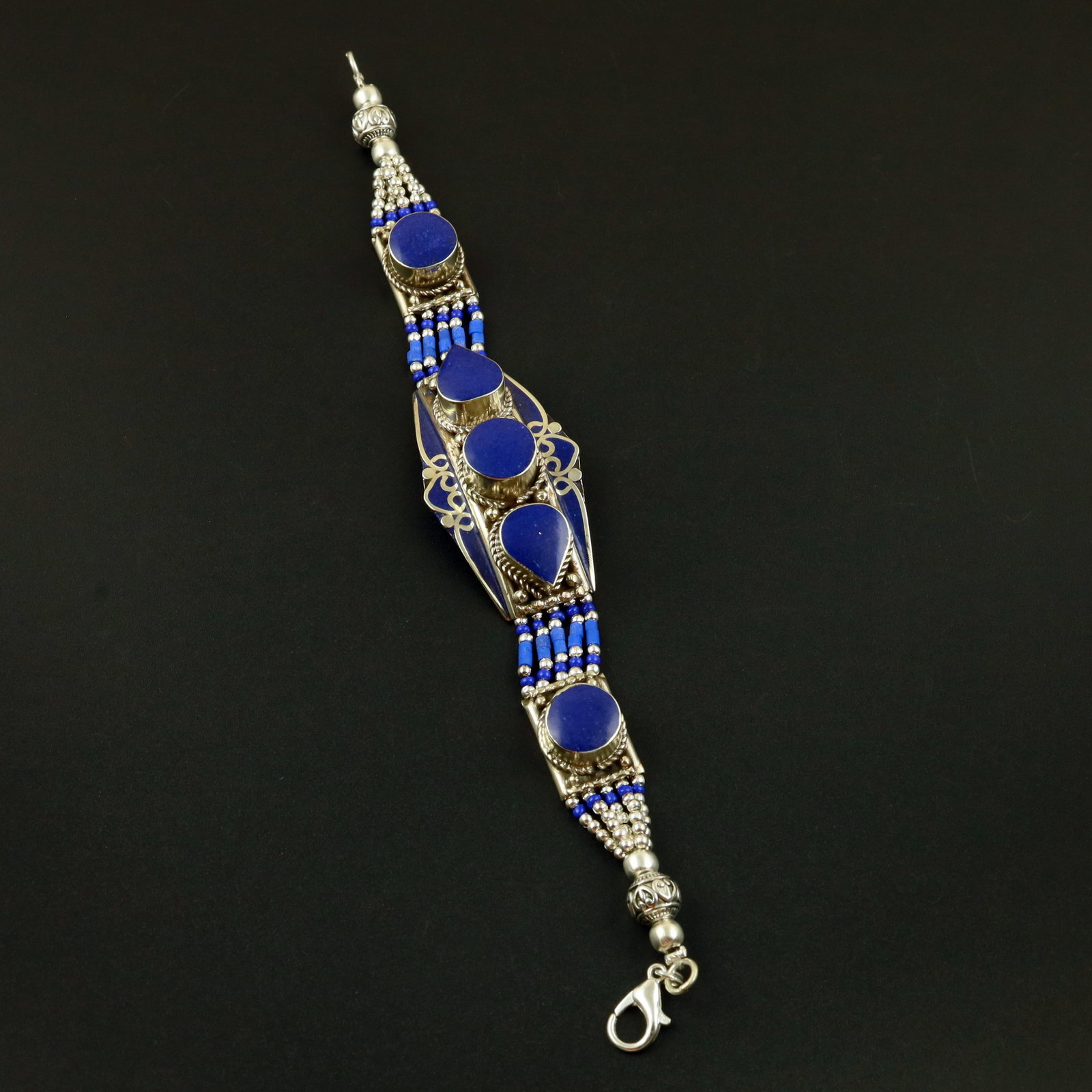 Tibetan Natural Lapis Lazuli Handmade Royal Bracelet: Product ID: 260513130155 Product - Tibetan Handmade Ethnic Bracelet Gemstone - Natural Lapis Lazuli Size - 7 Inch Weight - 50 Gram Approx Metal - Brass & Copper mix Metal Origin - Nepal Country/Region