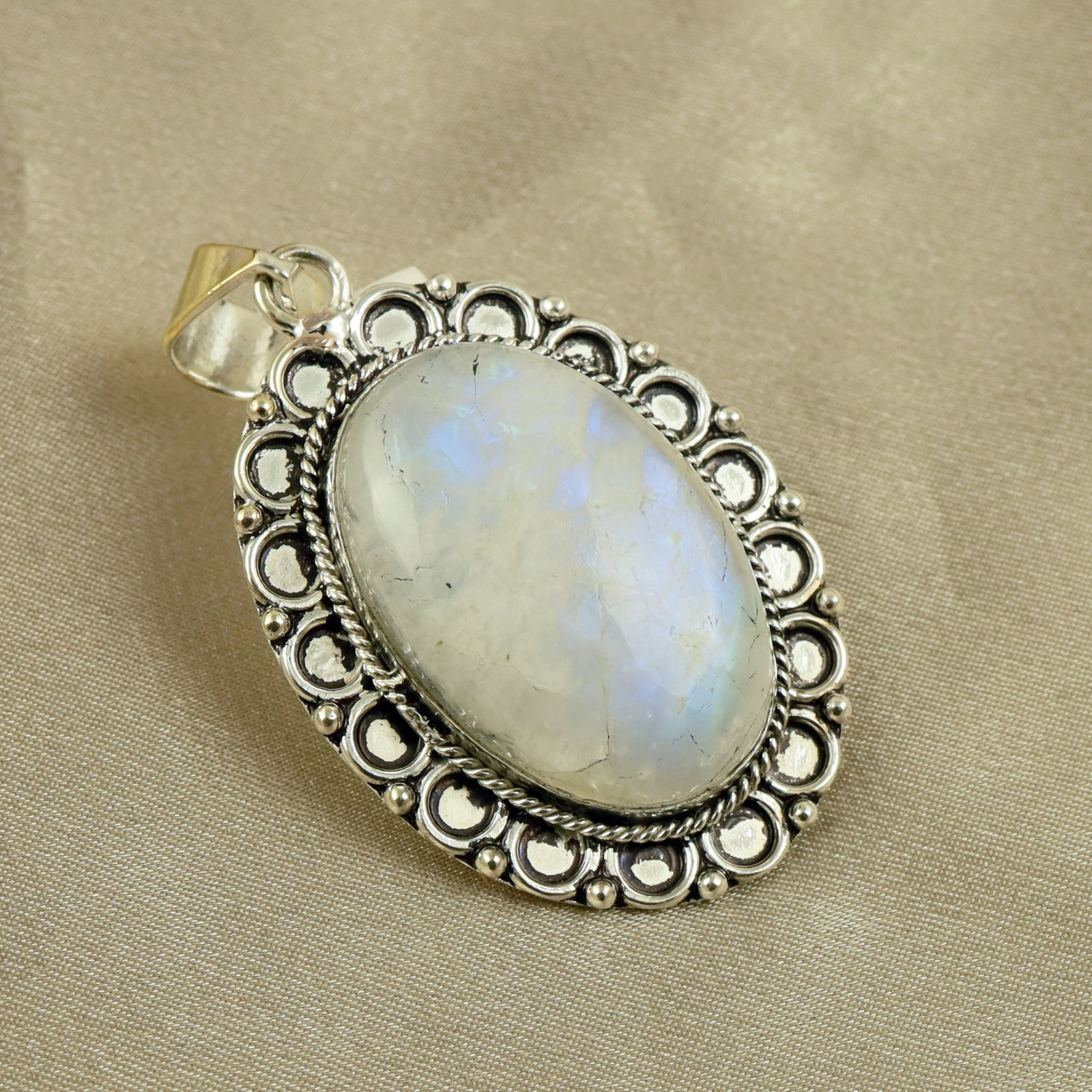 Natural Rainbow Moonstone Silver Plated Handmade Pendant: Product ID: 260518130344 Product - Handmade Silver Plated Pendant Metal - 92.5 Sterling Silver Plated Pendant Size - 4x3CM Gemstone - Rainbow Moonstone Gemstone Origin - India Gemstone Shape - Oval Pe