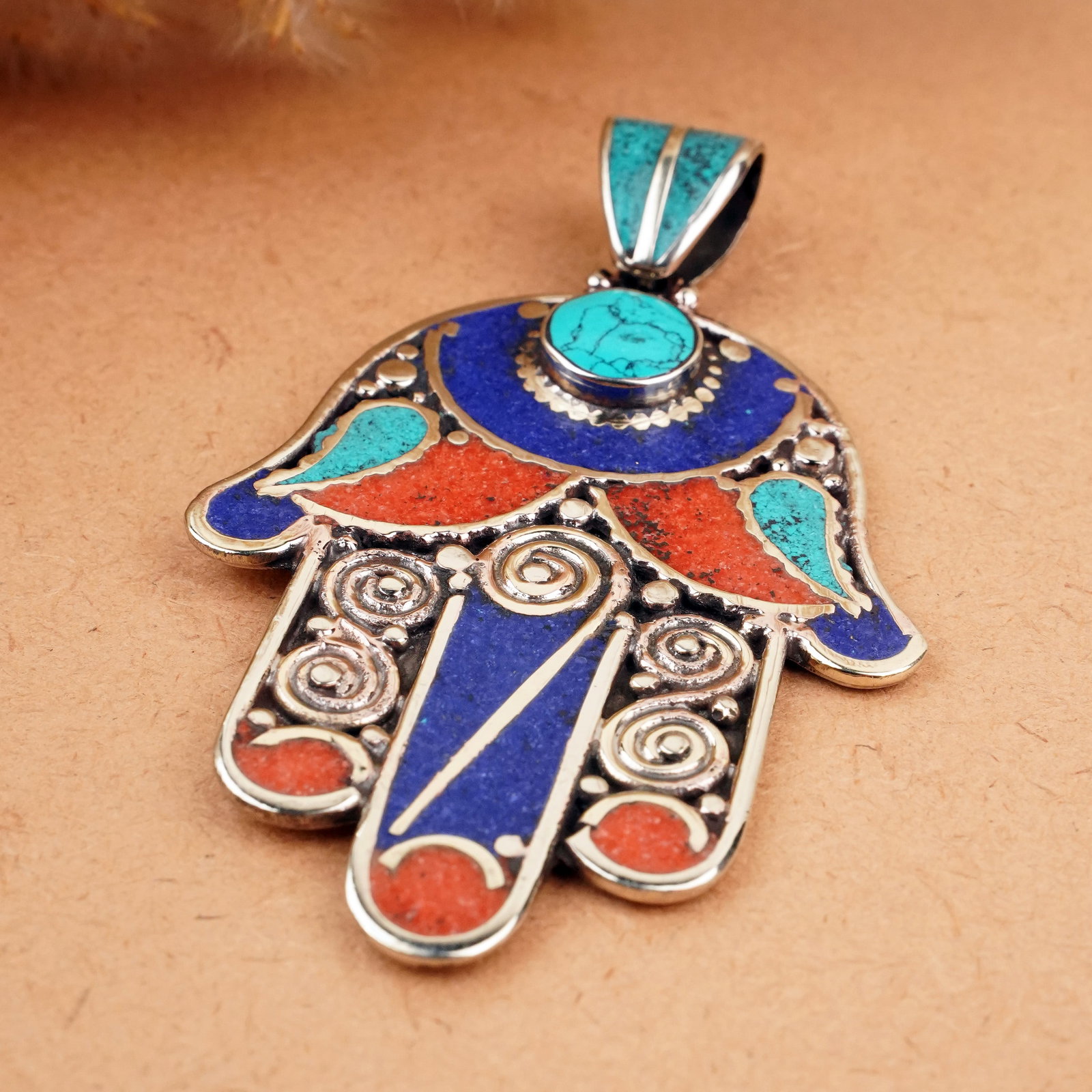 Tibetan Turquoise, Coral & Lapis Handmade Fatima Hand Pendant: Product ID: 260407145849 Product - Tibetan Handmade Ethnic Pendant Gemstone - Natural Turquoise & Coral & Lapis Pendant Size - 6.5X5 CM Pendant Weight - 23 Gram Metal - Brass & Copper mix Metal Origin