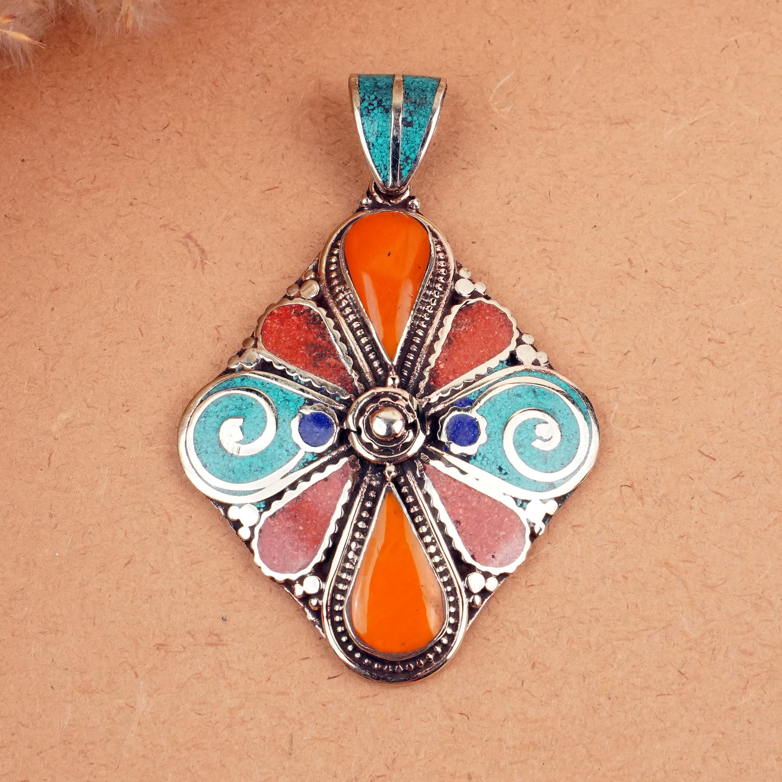 Tibetan Turquoise & Coral Handmade Hippie Pendant: Product ID: 260407145711 Product - Tibetan Handmade Ethnic Pendant Gemstone - Natural Turquoise & Coral & Copal & Lapis Pendant Size - 6X5 CM Pendant Weight - 24 Gram Metal - Brass & Copper mix Metal 