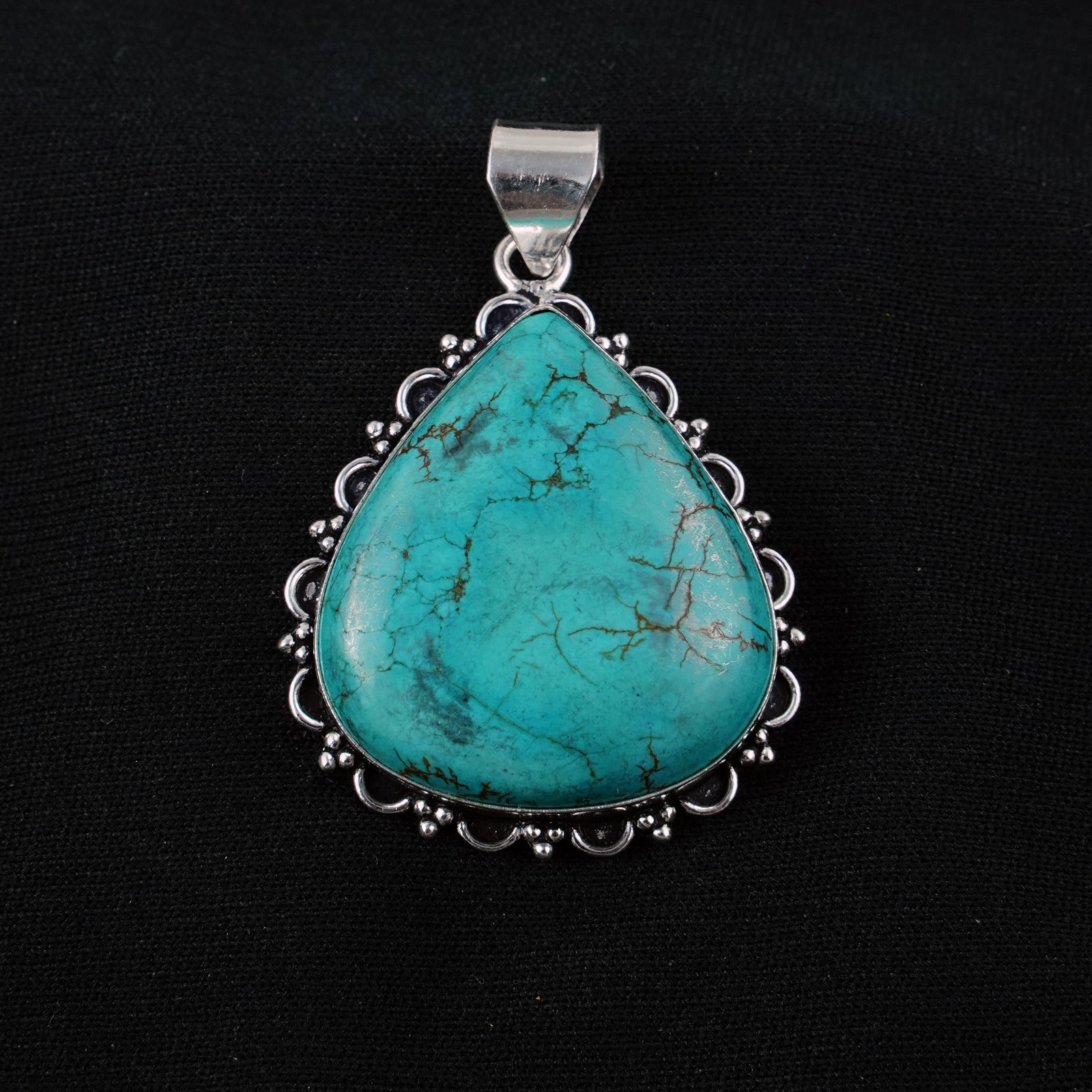 Natural Turquoise Sterling Silver Plated Handmade Pendant: Product ID: 260405100949 Product - Handmade Silver Plated Pendant Metal - 92.5 Sterling Silver Plated Pendant Size - 4x3 CM Gemstone - Turquoise Gemstone Origin - Tibet Gemstone Shape - Pear Pendant W