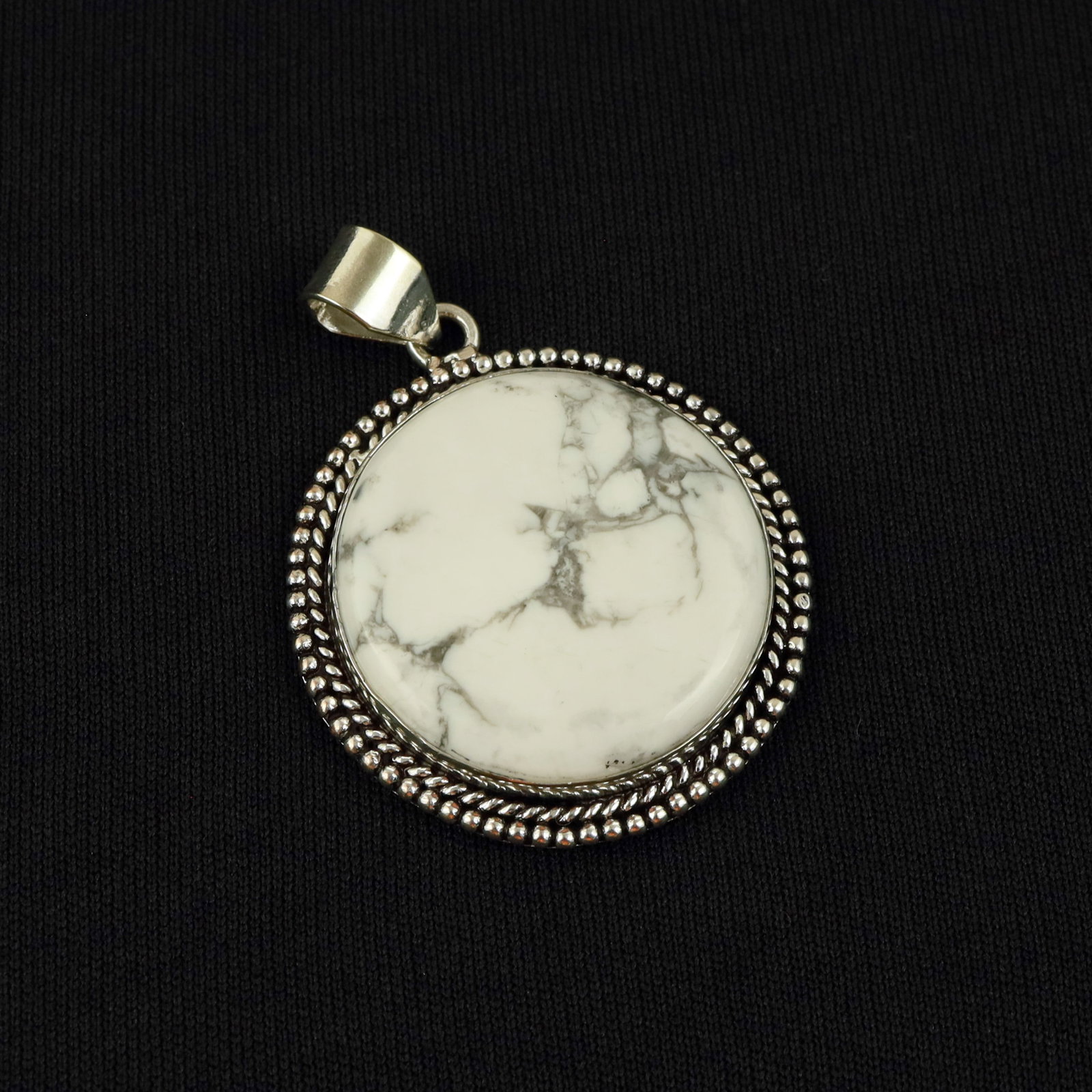 Natural Howlite Sterling Silver Plated Handmade Pendant: Product ID: 260517184328 Product - Handmade Silver Plated Pendant Metal - 92.5 Sterling Silver Plated Pendant Size - 3.5 CM Gemstone - Howlite Gemstone Origin - Canada Gemstone Shape - Round Pendant W