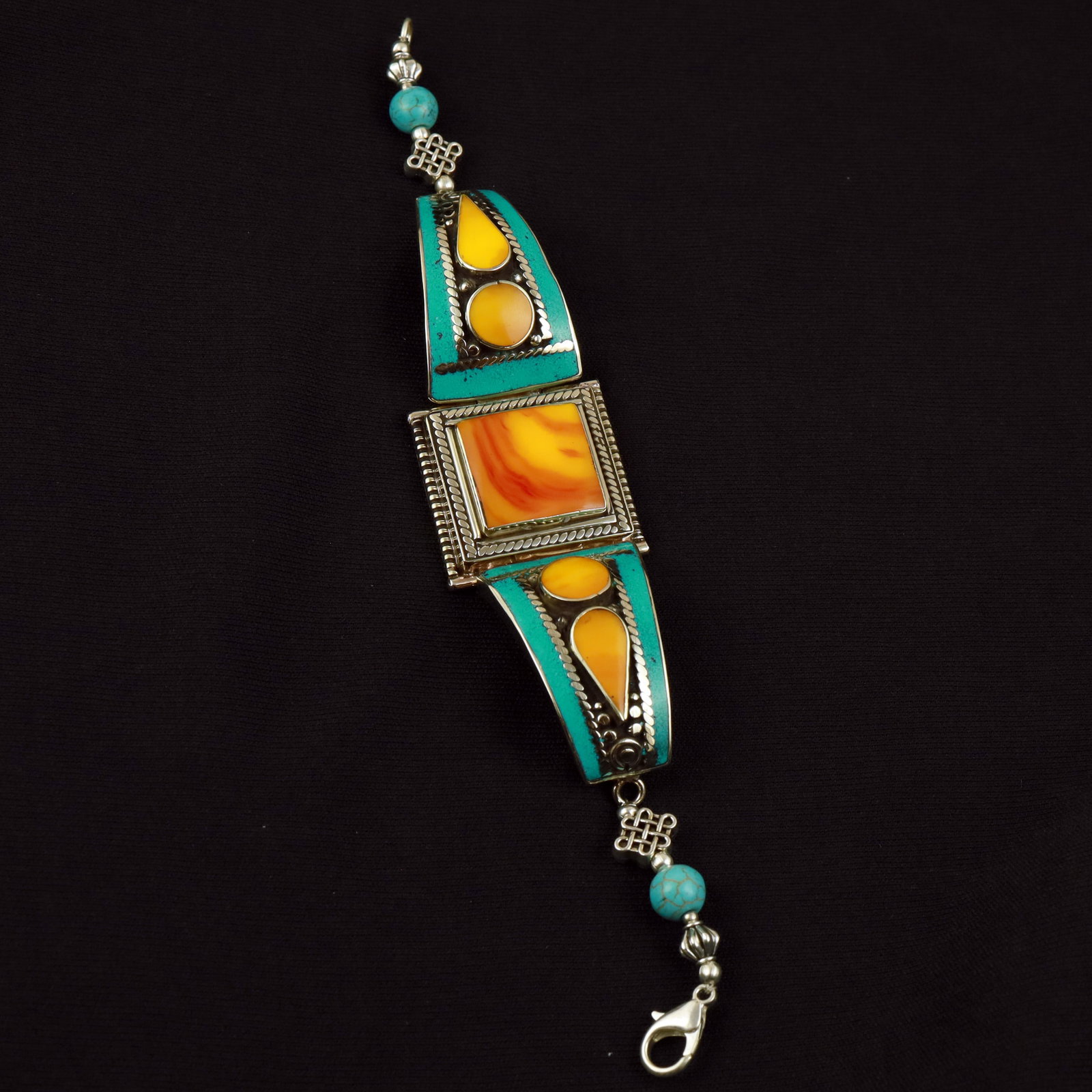 Tibetan Turquoise & Copal Handmade Ethnic Bracelet: Product ID: 260517173830 Product - Tibetan Handmade Ethnic Bracelet Gemstone - Natural Turquoise & Copal Size - 7 Inch Weight - 45 Gram Approx Metal - Brass & Copper mix Metal Origin - Nepal Country/R