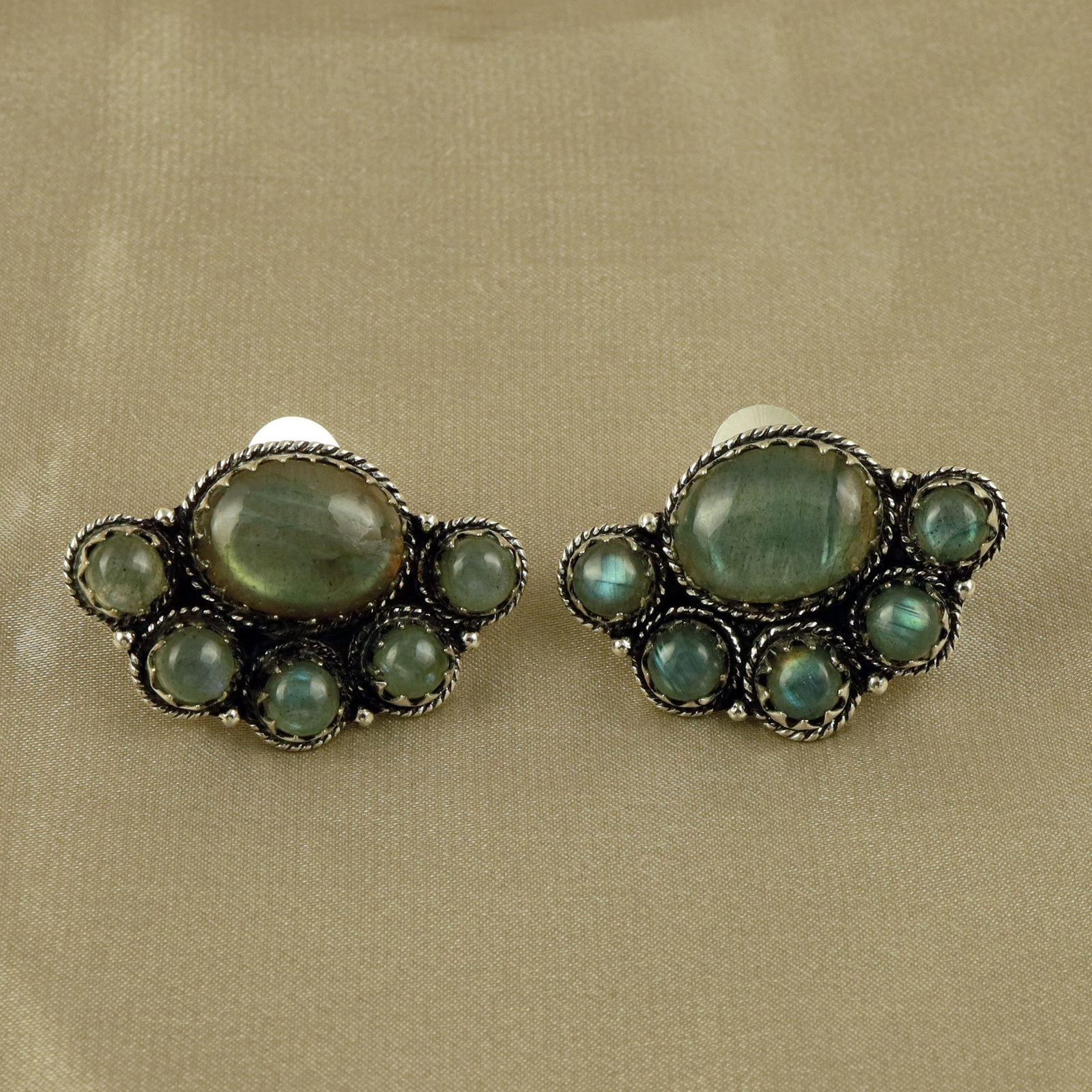 Natural Labradorite Silver Plated Handmade Stud Earring: Product ID: 260517172749 Product - Handmade Silver Plated Stud Earring Metal - 92.5 Sterling Silver Plated Earring Type - Stud Gemstone - Labradorite Gemstone Origin - Canada Gemstone Size - 10X14 MM 