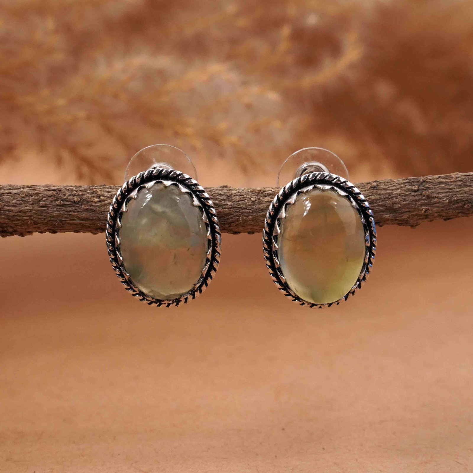 Natural Prehnite Silver Plated Handmade Stud Earring: Product ID: 260413110512 Product - Handmade Silver Plated Stud Earring Metal - 92.5 Sterling Silver Plated Earring Type - Stud Gemstone - Prehnite Gemstone Origin - South Africa Gemstone Size - 12X16 