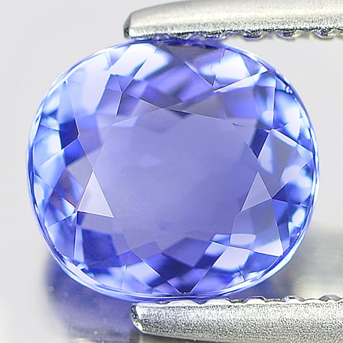 Natural Violetish Blue Tanzanite Gemstones 1.05 Ct. Clean Oval Shape 6.7 x 6 Mm.: Product ID: 807005932 Product Name: Natural Tanzanite Weight: 1.05 CT. Size: 6.7 x 6 x 3.1 MM. Shape: Oval Color: Blue Clarity:IF Luster: Very Good Gems Origin: Tanzania Treatment: Heated Crystal Stru