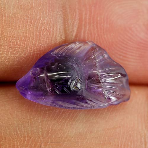 Natural Violet Amethyst Gemstones 3.85 Ct. Fish Carving Shape 15.7 x 8.7 Mm.: Product ID: 810303673 Product Name: Natural Amethyst Weight: 3.85 CT. Size: 15.7 x 8.7 x 5.5 MM. Shape: Fish Carving Color: Violet Clarity:Semi - Transparent Luster: Good Gems Origin: Brazil Treatment