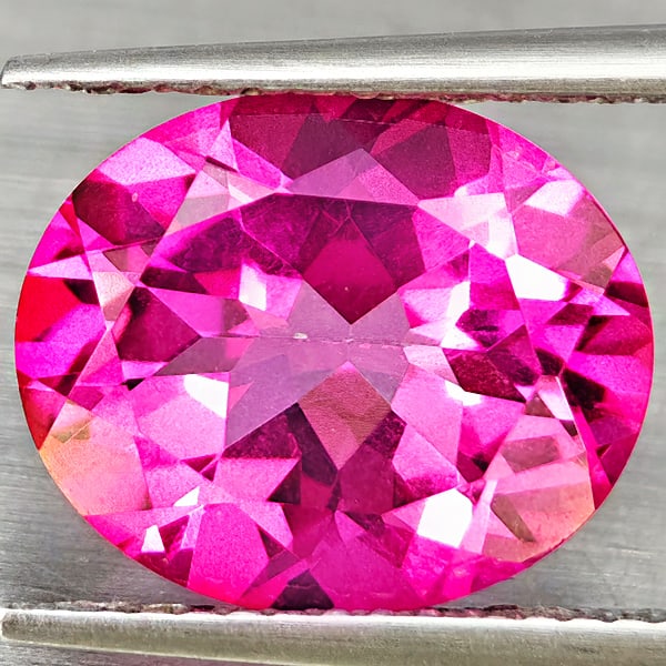 Natural Pink Topaz Gemstones 5.57 Ct. Oval Shape 12 x 10 Mm.: Product ID: 807168671 Product Name: Natural Topaz Weight: 5.57 CT. Size: 12 x 10 x 6.6 MM. Shape: Oval Shape Color: Pink Clarity:VSI Luster: Good Gems Origin: Brazil Treatment: Treated Crystal Structu