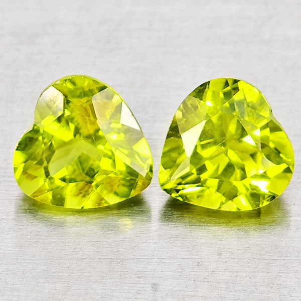 Natural Green Peridot Gemstones 1.81 Ct. 2 Pcs. Heart Shape 6 x 6 Mm.: Product ID: 805317309 Product Name: Natural Peridot Weight: 1.81 CT. Size: 6 x 6 x 3.9 MM. Shape: Heart Shape Color: Green Clarity:VSI - SI1 Luster: Good Gems Origin: Pakistan Treatment: Unheated Crys