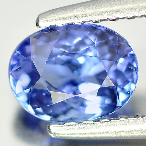 Natural Violet Blue Tanzanite Gemstones 0.89 Ct. Oval Shape 6.4 x 4.9 Mm.: Product ID: 807004754 Product Name: Natural Tanzanite Weight: 0.89 CT. Size: 6.4 x 4.9 x 3.8 MM. Shape: Oval Color: Violet Blue Clarity:VVS Luster: Good Gems Origin: Tanzania Treatment: Heated Crystal
