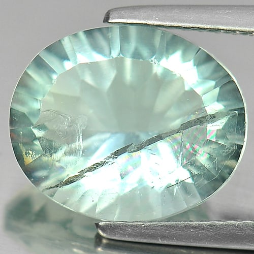 Natural Greenish Blue Fluorite Gemstones 5.56 Ct. Oval Concave Cut 12.3 x 10.2 Mm. (1 of 3)