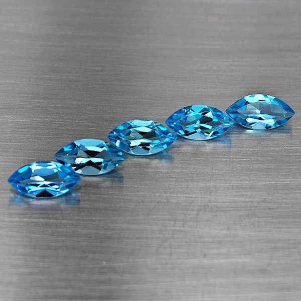 Natural Swiss Blue Topaz Gemstones 6.20 Ct. 5 Pcs. Marquise Shape 9.9 x 5.2 Mm.: Product ID: 807168707 Product Name: Natural Blue Topaz Weight: 6.20 CT. Size: 9.9 x 5.2 x 4 MM. Shape: Marquise Shape Color: Swiss Blue Clarity:VSI Luster: Good Gems Origin: Brazil Treatment: Treated 