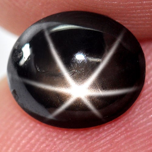 Natural Black Star Sapphire Gemstones 1.94 Ct. Oval Cabochon Shape 8.5 x 7.2 Mm.: Product ID: 806136561 Product Name: Natural Star Sapphire Weight: 1.94 CT. Size: 8.5 x 7.2 x 3 MM. Shape: Oval Cabochon Color: Black Clarity:Opaque Luster: Good 6 Rays Star Gems Origin: Thailand Treat