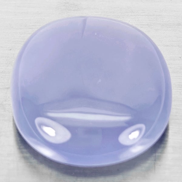 Natural Lavender Chalcedony Gemstones 42.39 Ct. Oval Cabochon Shape 25 x 23 Mm.: Product ID: 801502650 Product Name: Natural Weight: 42.39 CT. Size: 25 x 23 x 9.8 MM. Shape: Oval Cabochon Color: Lavender Clarity:Semi - Transparent Luster: Good Gems Origin: Russia Treatment: Unheat