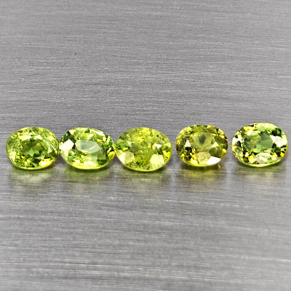 Natural Green Demantiod Garnet Gemstones 1.18 Ct. 5 Pcs. Oval Shape 4.2 x 3.2 Mm.: Product ID: 802937556 Product Name: Natural Demantoid Weight: 1.18 CT. Size: 4.2 x 3.2 x 2 MM. Shape: Oval Color: Green Clarity:SI1 Luster: Good Gems Origin: Madagascar Treatment: Unheated Crystal Str