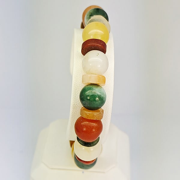 Natural Multi Color Jade Gemstones 188.11 Ct. Beads Stretch Bracelet: Product ID: 818102735 Product Name: Natural Jade Weight: 188.11 CT. Size: 3 x 11 MM. Shape: Mix Cabochon Color: Multi-Color Green Clarity:Opaque Luster: Good Gems Origin: Thailand Treatment: Unheated 