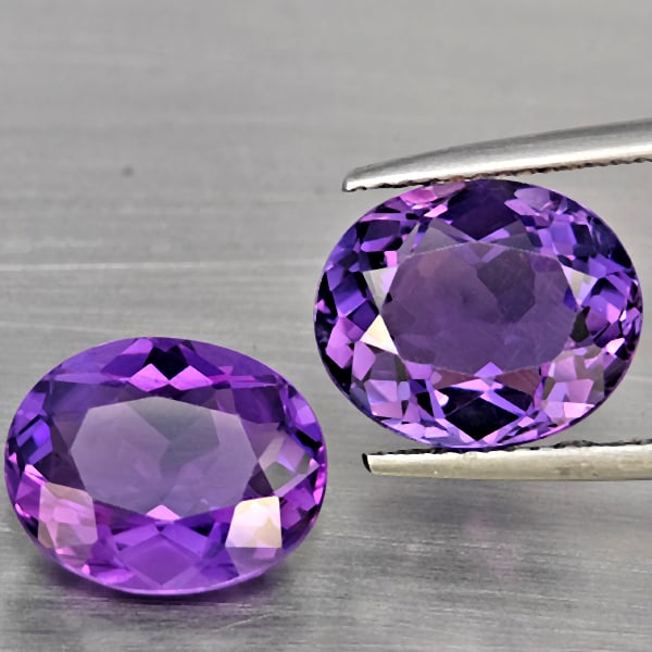 Natural Purple Amethyst Gemstones 7.76 Ct. 2 Pcs Oval Shape 11.3 x 9.3 Mm.: Product ID: 800325627 Product Name: Natural Amethyst Weight: 7.76 CT. Size: 11.3 x 9.3 x 6 MM. Shape: Oval Color: Purple Clarity:VVS Luster: Very Good Gems Origin: Brazil Treatment: Unheated Crystal S