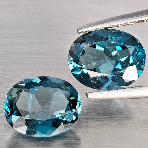 Natural London Blue Topaz Gemstone 3.99 Ct. 2 Pcs. Oval Shape 8.9 x 7.2 Mm.: Product ID: 807168904 Product Name: Natural Blue Topaz Weight: 3.99 CT. Size: 8.9 x 7.2 x 4.5 MM. Shape: Oval Color: London Blue Clarity:SI1 Luster: Good Gems Origin: Brazil Treatment: Treated Crystal