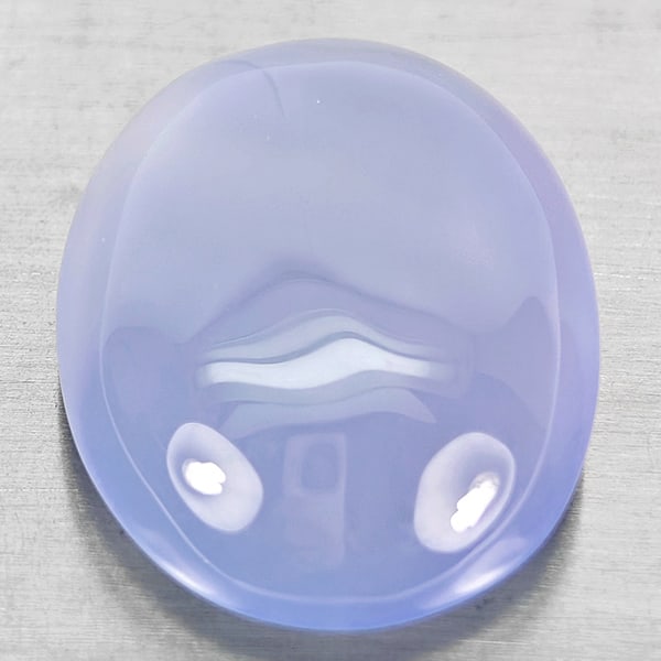 Natural Lavender Chalcedony Gemstones 24.69 Ct. Oval Cabochon Shape 23 x 17.8 Mm.: Product ID: 801502724 Product Name: Natural Weight: 24.69 CT. Size: 23 x 17.8 x 9 MM. Shape: Oval Cabochon Color: Lavender Clarity:Semi - Transparent Luster: Good Gems Origin: Russia Treatment: Unheat