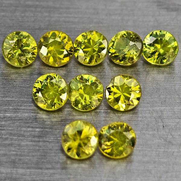 Natural Green Demantiod Garnet Gemstones 1.56 Ct. 10 Pcs. Round Diamond Cut 3.3 Mm.: Product ID: 802937645 Product Name: Natural Demantoid Weight: 1.56 CT. Size: 3.3 x 3.3 x 2.3 MM. Shape: Round Diamond Cut Color: Green Clarity:SI1 Luster: Good Gems Origin: Madagascar Treatment: Unhea
