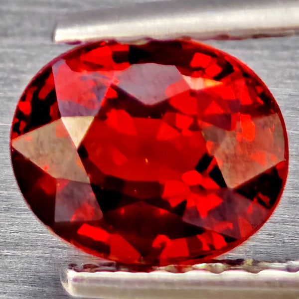 Natural Orangish Red Spessartine Garnet Gemstones 1.16 Ct. Oval Shape 6.4 x 5.2 Mm.: Product ID: 802937362 Product Name: Natural Garnet Weight: 1.16 CT. Size: 6.4 x 5.2 x 3.6 MM. Shape: Oval Shape Color: Orangish Red Clarity:SI1 Luster: Good Gems Origin: Namibia Treatment: Unheated Cr