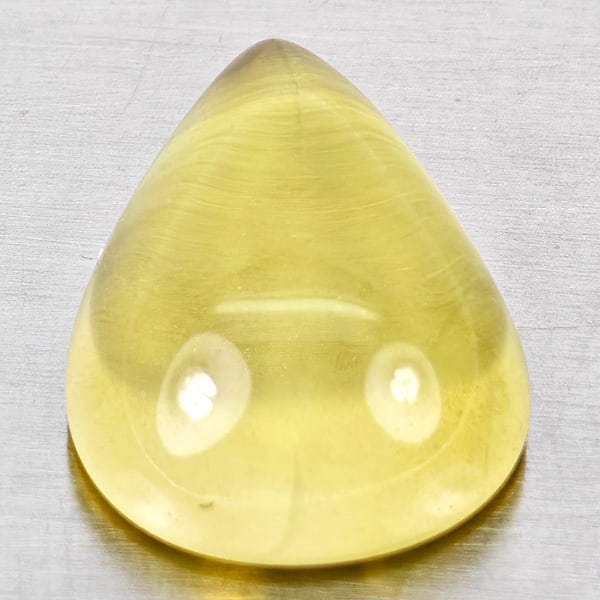 Natural Yellow Lemon Quartz Gemstones 9.18 Ct. Pear Cabochon Shape 17 x 12.3 Mm.: Product ID: 805530078 Product Name: Natural Quartz Weight: 9.18 CT. Size: 17 x 12.3 x 7.3 MM. Shape: Pear Cabochon Color: Yellow Clarity:None Luster: Good Gems Origin: Brazil Treatment: Unheated Cryst