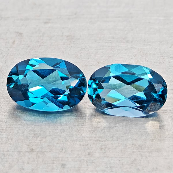 Natural London Blue Topaz Gemstones 1.05 Ct. 2 Pcs. Oval Shape 6 x 4 Mm.: Product ID: 807168468 Product Name: Natural Blue Topaz Weight: 1.05 CT. Size: 6 x 4 x 2.5 MM. Shape: Oval Shape Color: London Blue Clarity:VSI - SI1 Luster: Good Gems Origin: Brazil Treatment: Treated