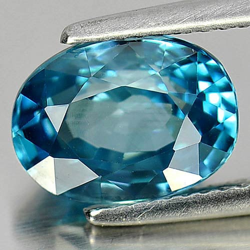 Natural Blue Zircon Gemstones 5.37 Ct. Oval Shape 10.5 x 7.8 Mm.: Product ID: 807727456 Product Name: Natural Zircon Weight: 5.37 CT. Size: 10.5 x 7.8 x 6 MM. Shape: Oval Color: Blue Clarity:VVS Luster: Very Good Gems Origin: Cambodia Treatment: Heated Crystal Struc