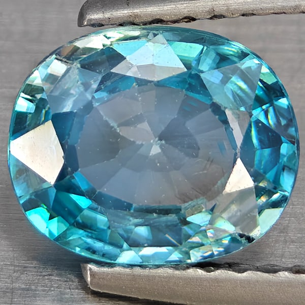 Natural Blue Zircon Gemstones 2.26 Ct. Oval Shape 6.9 x 8.4 Mm.: Product ID: 807743085 Product Name: Natural Zircon Weight: 2.26 CT. Size: 6.9 x 8.4 x 3.6 MM. Shape: Oval Shape Color: Blue Clarity:VSI Luster: Good Gems Origin: Cambodia Treatment: Heated Crystal Str