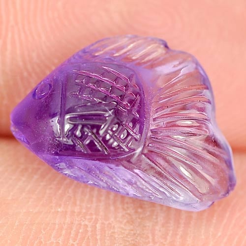 Natural Purple Amethyst Gemstones 4.57 Ct. Fish Carving 14.5 x 9.4 Mm.: Product ID: 810303973 Product Name: Natural Amethyst Weight: 4.57 CT. Size: 14.5 x 9.4 x 6.5 MM. Shape: Fish Carving Color: Purple Clarity:Semi - Transparent Luster: Good Gems Origin: Brazil Treatment