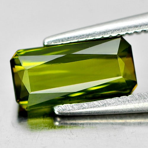 Natural Green Tourmaline Gemstones 1.38 Ct. Octagon Shape 9.1 x 4.6 Mm.: Product ID: 807242632 Product Name: Natural Tourmaline Weight: 1.38 CT. Size: 9.1 x 4.6 x 3.4 MM. Shape: Octagon Color: Green Clarity:VSI Luster: Good Gems Origin: Nigeria Treatment: Heated Crystal St